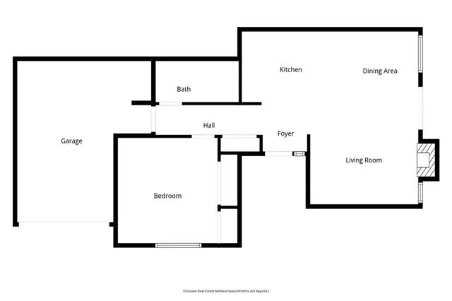 a bed room with a bed and a window