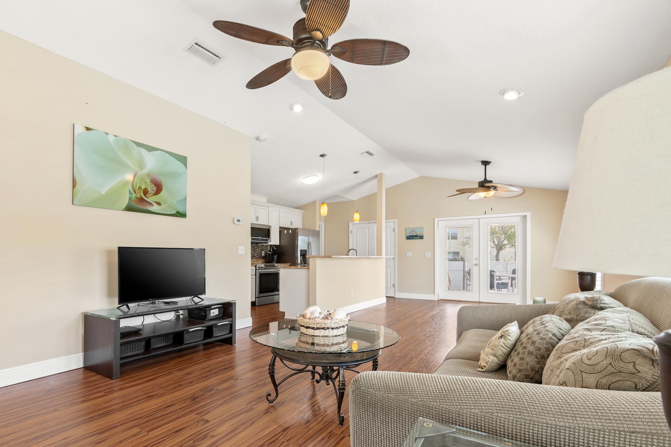 32 Comares Avenue St. Augustine, FL 32080 - Photo 11 of 43 a living room with furniture and a flat screen tv