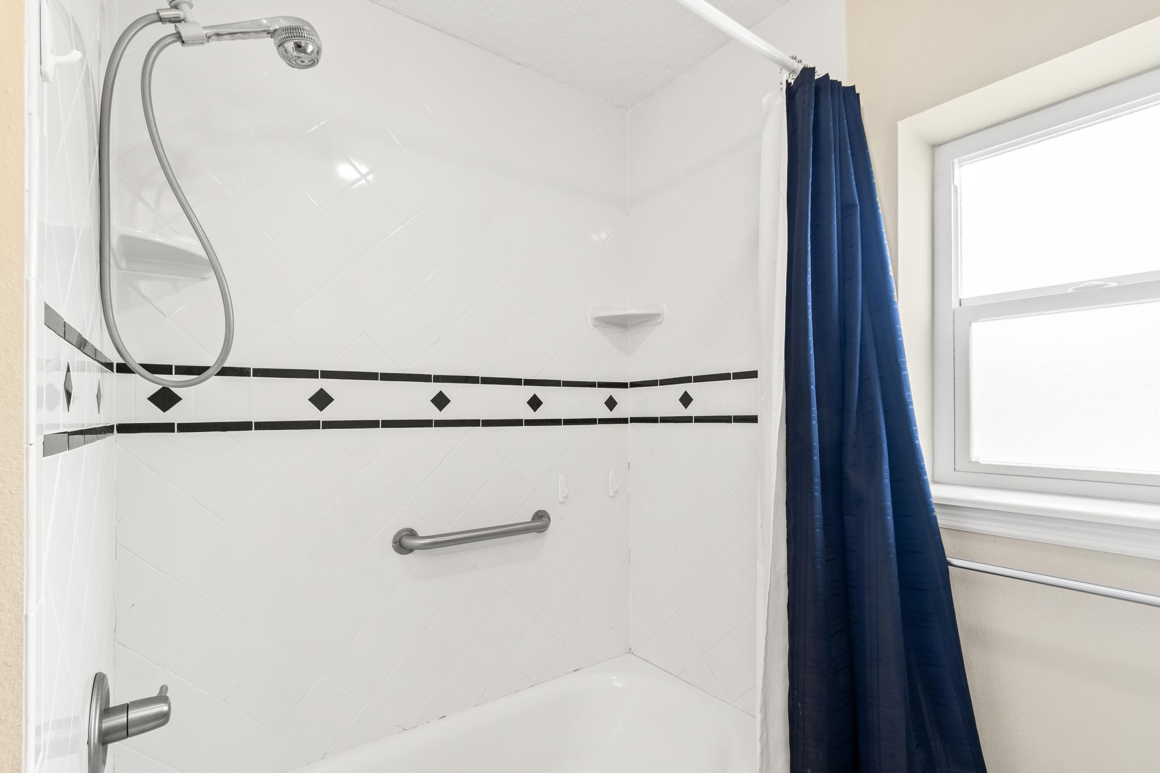 32 Comares Avenue St. Augustine, FL 32080 - Photo 23 of 43 a bathroom with a shower