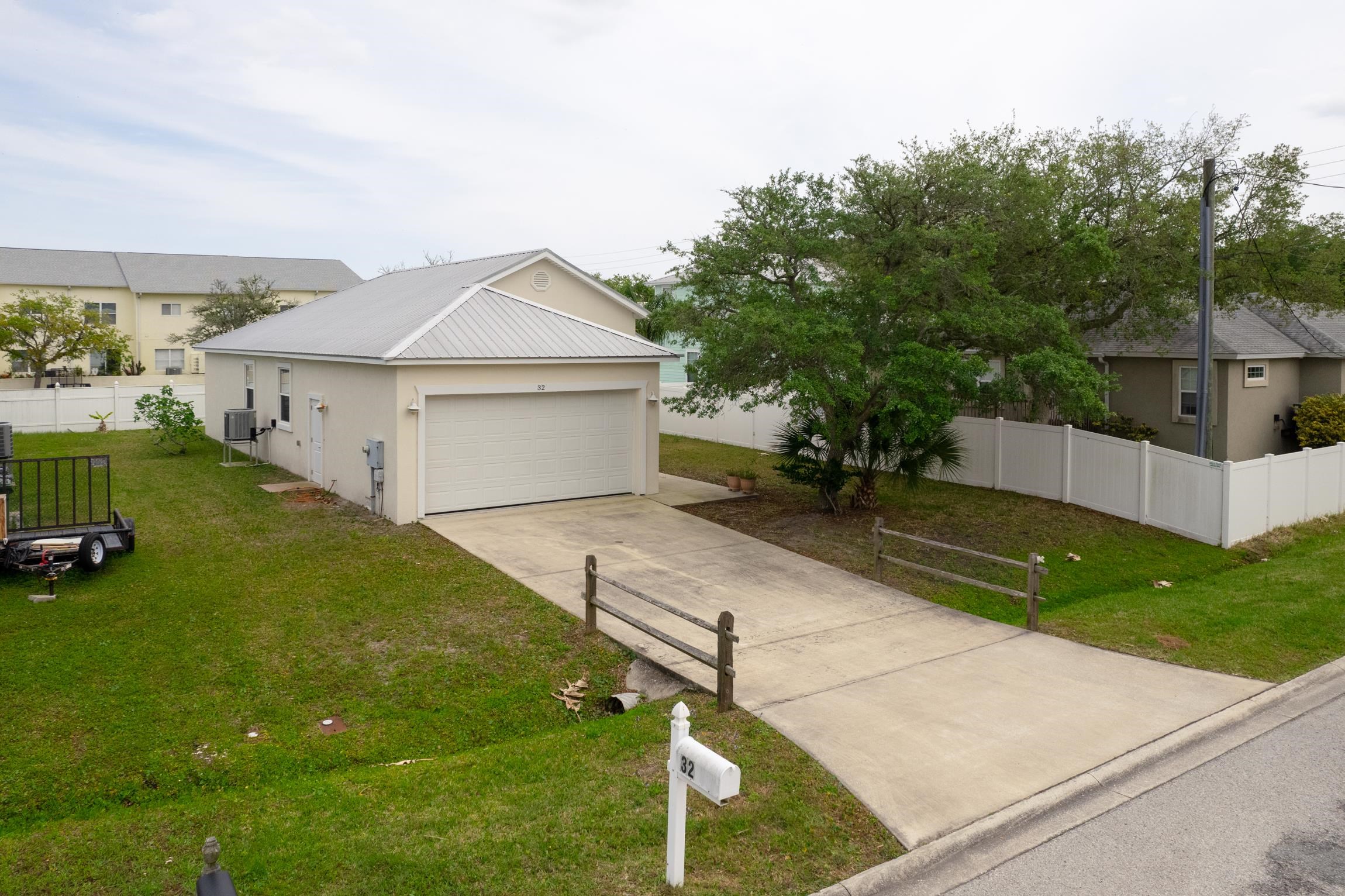 32 Comares Avenue St. Augustine, FL 32080 - Photo 37 of 43 a house view with a garden space