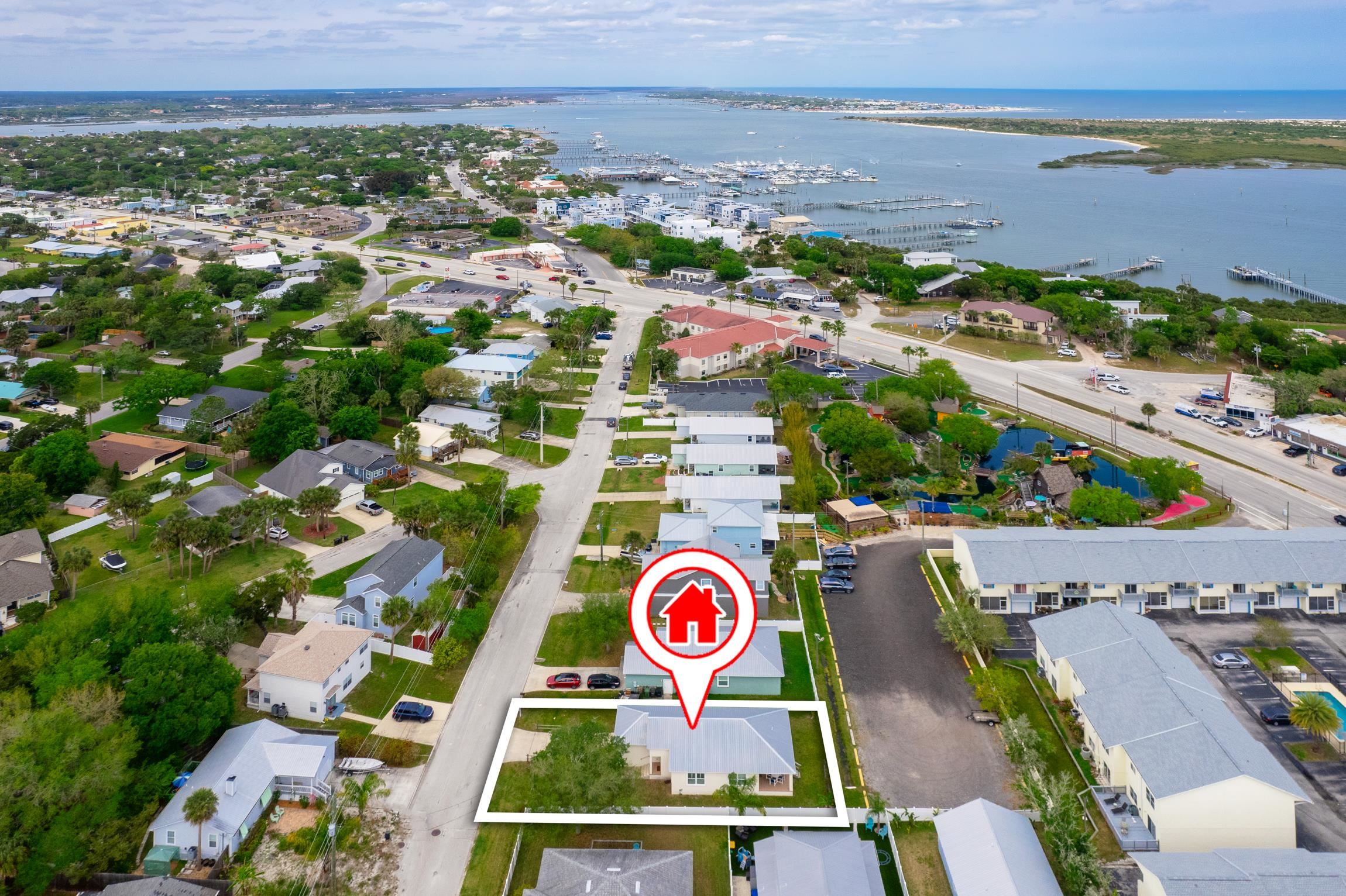 32 Comares Avenue St. Augustine, FL 32080 - Photo 42 of 43 an aerial view of residential building and lake