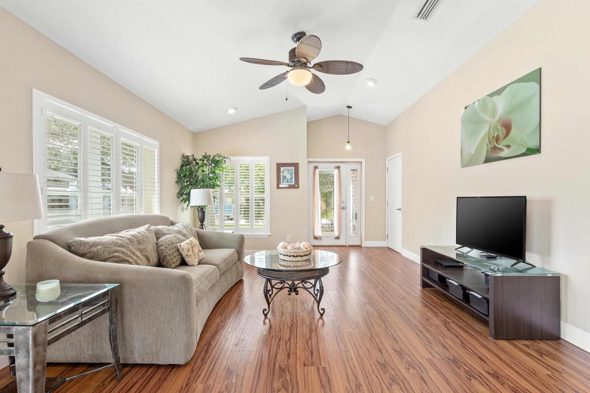 32 Comares Avenue St. Augustine, FL 32080 - Photo 10 of 43 a living room with furniture and a flat screen tv