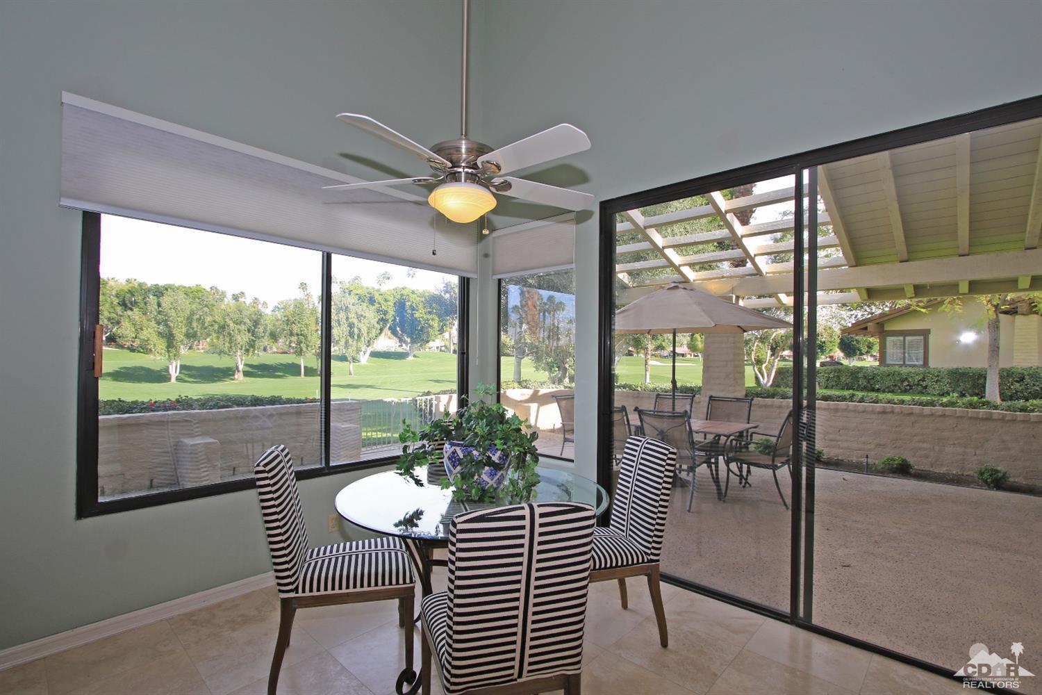 198 Ranch View Circle Palm Desert, CA 92211 - Photo 17 of 54 a view of a dining room and furniture window and outside view