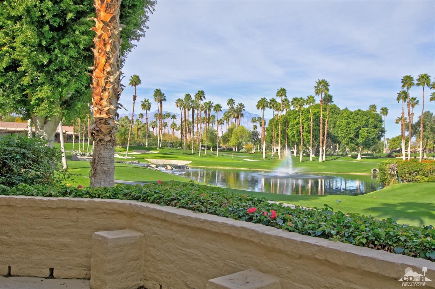 198 Ranch View Circle Palm Desert, CA 92211 - Photo 3 of 54 a front view of a building with garden