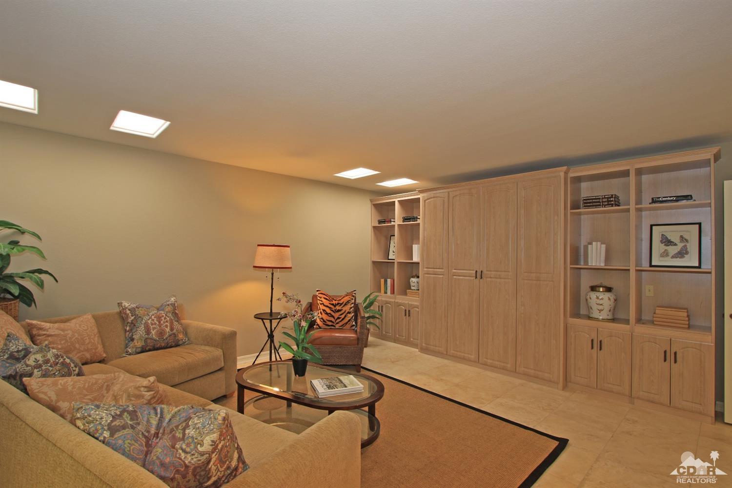 198 Ranch View Circle Palm Desert, CA 92211 - Photo 24 of 54 a living room with furniture