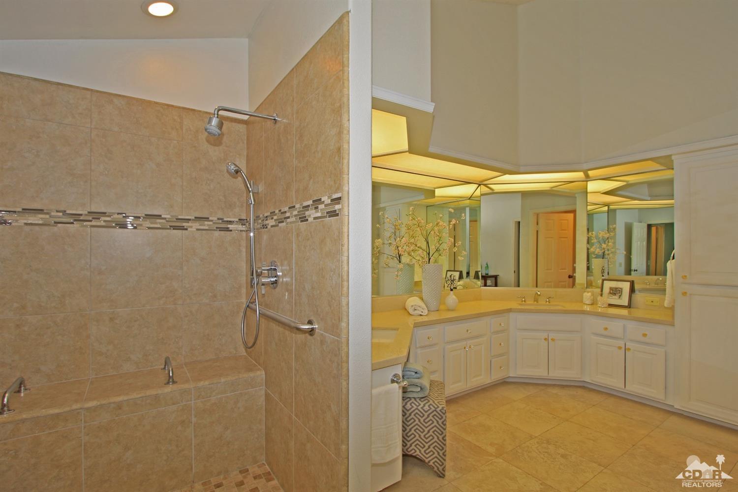 198 Ranch View Circle Palm Desert, CA 92211 - Photo 29 of 54 a bathroom with a shower and a sink