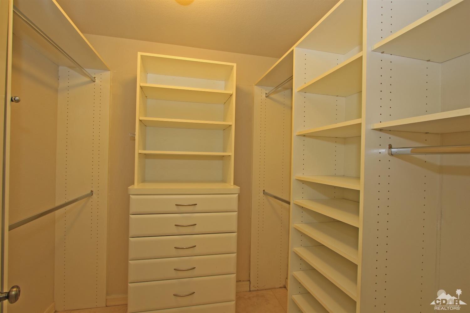 198 Ranch View Circle Palm Desert, CA 92211 - Photo 32 of 54 a view of walk in closet