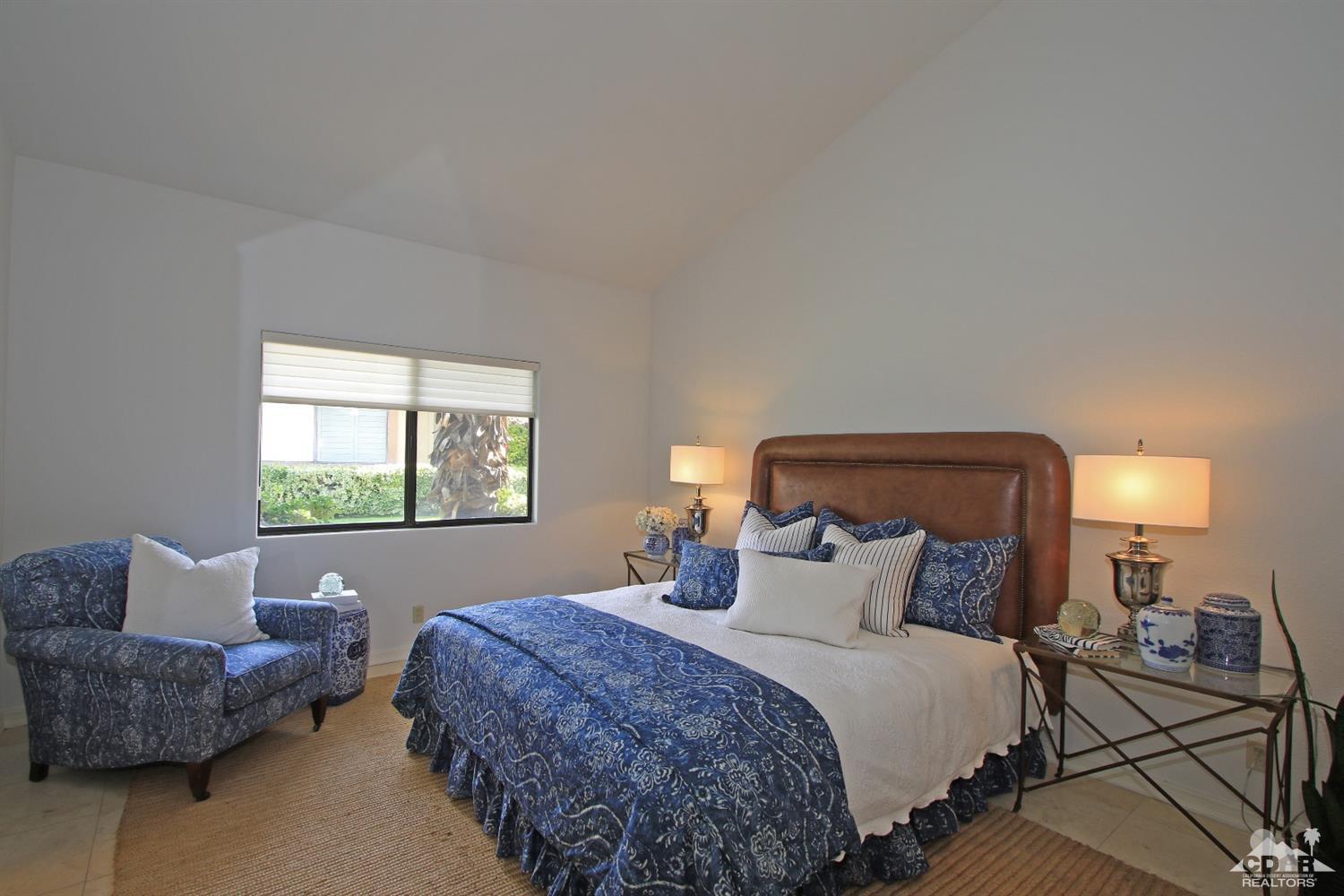 198 Ranch View Circle Palm Desert, CA 92211 - Photo 34 of 54 a bedroom with bed window and couch