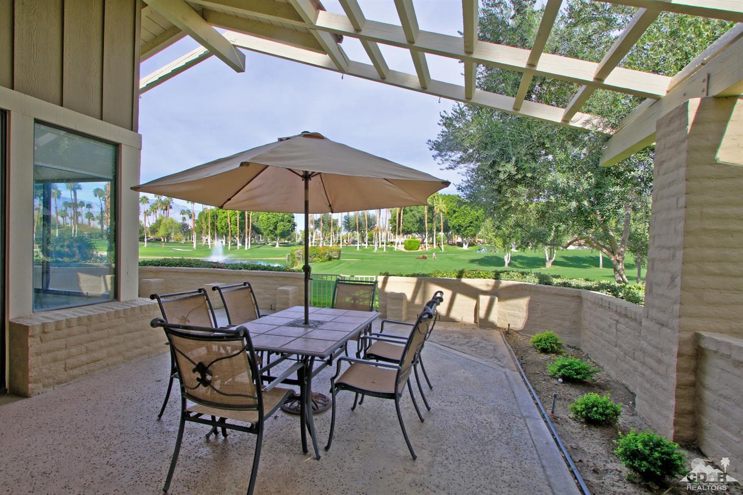 198 Ranch View Circle Palm Desert, CA 92211 - Photo 40 of 54 a view of an outdoor sitting area with furniture and backyard