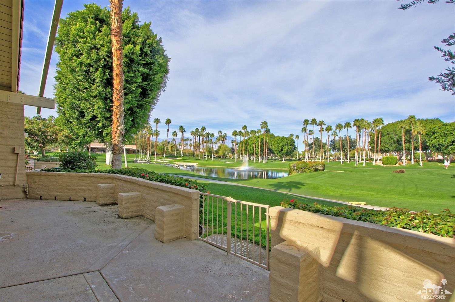 198 Ranch View Circle Palm Desert, CA 92211 - Photo 41 of 54 a city view with tall trees and a big yard