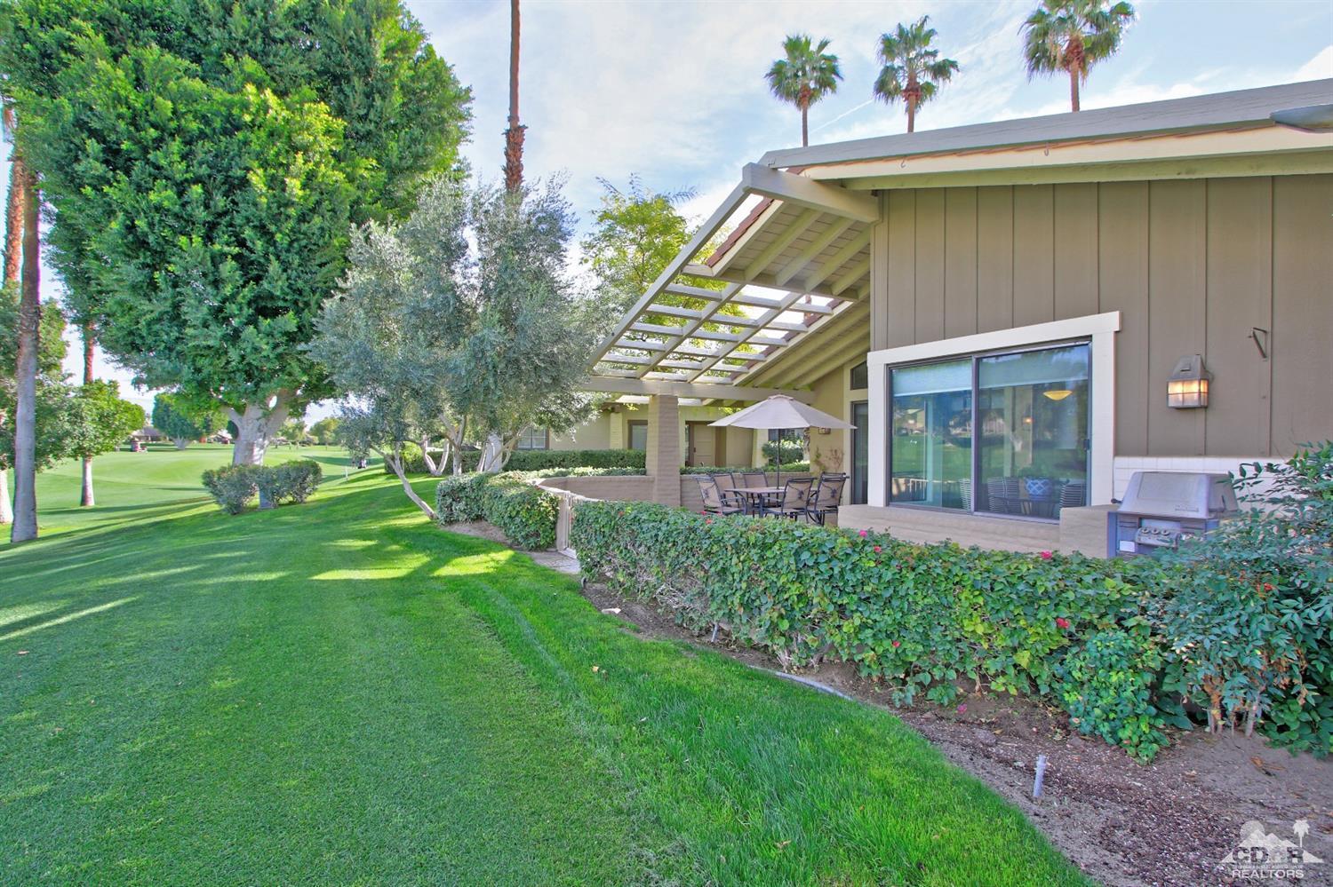 198 Ranch View Circle Palm Desert, CA 92211 - Photo 47 of 54 a view of a house with a yard porch and sitting area