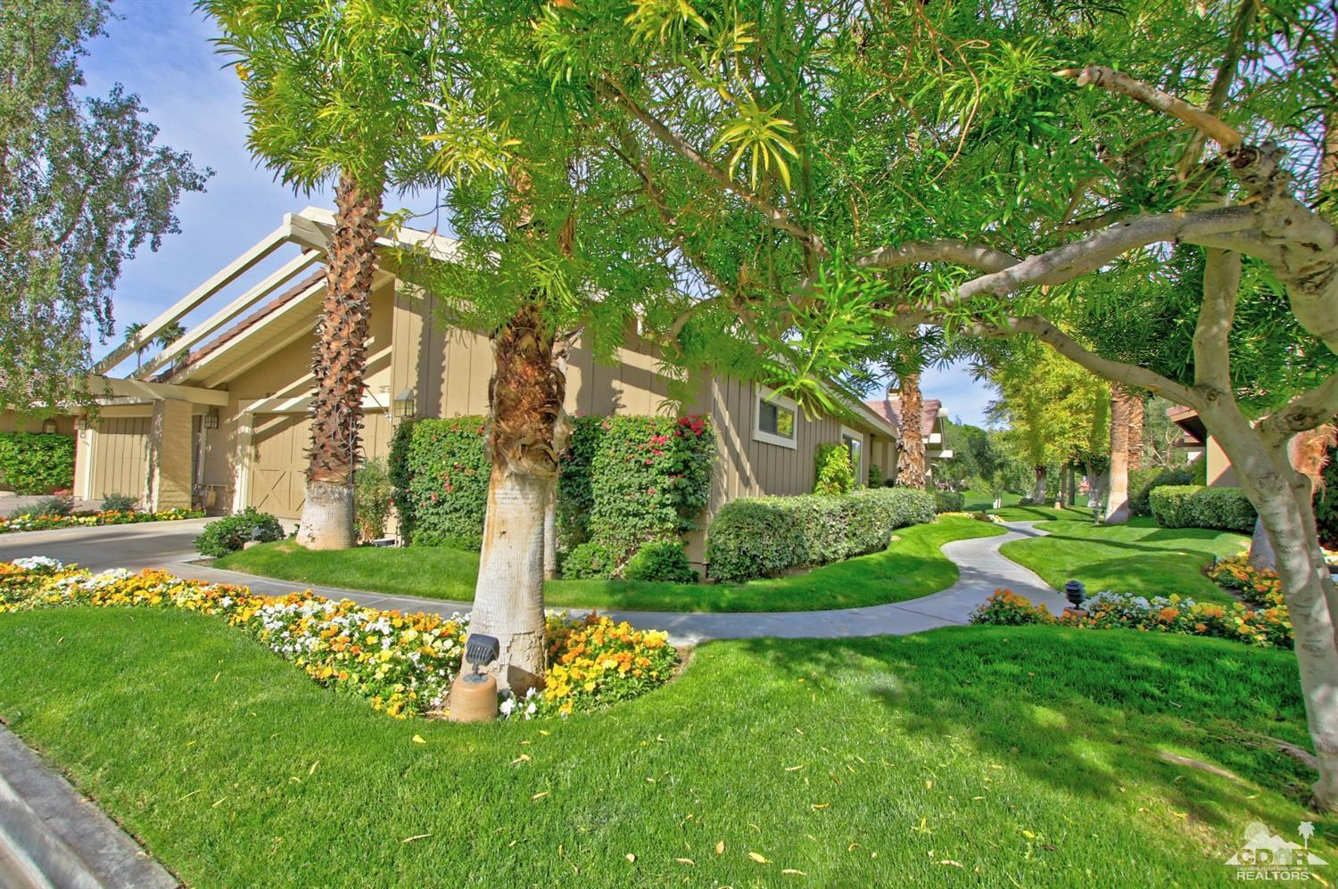 198 Ranch View Circle Palm Desert, CA 92211 - Photo 48 of 54 a front view of a house with a yard