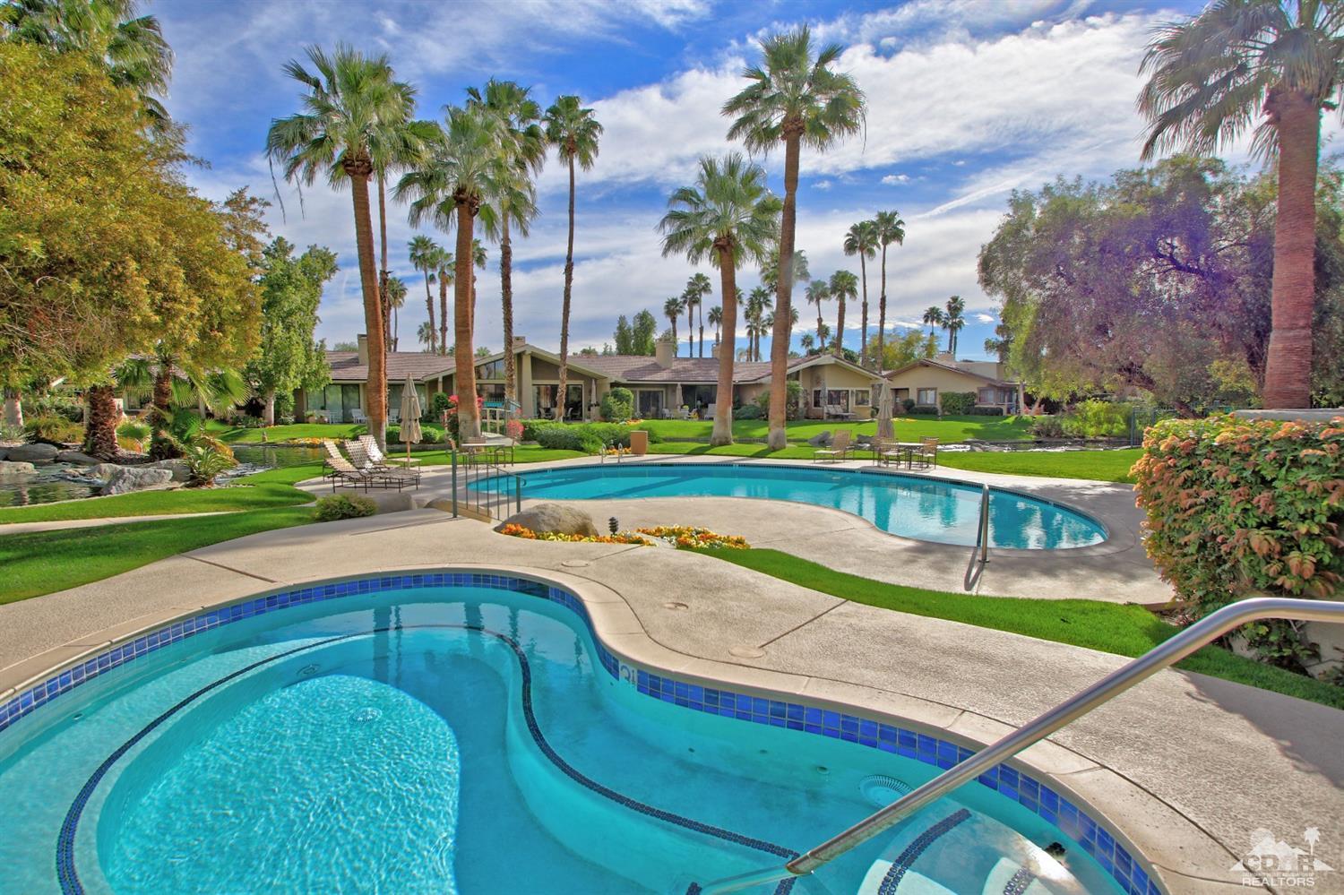 198 Ranch View Circle Palm Desert, CA 92211 - Photo 52 of 54 a swimming pool with outdoor seating and yard