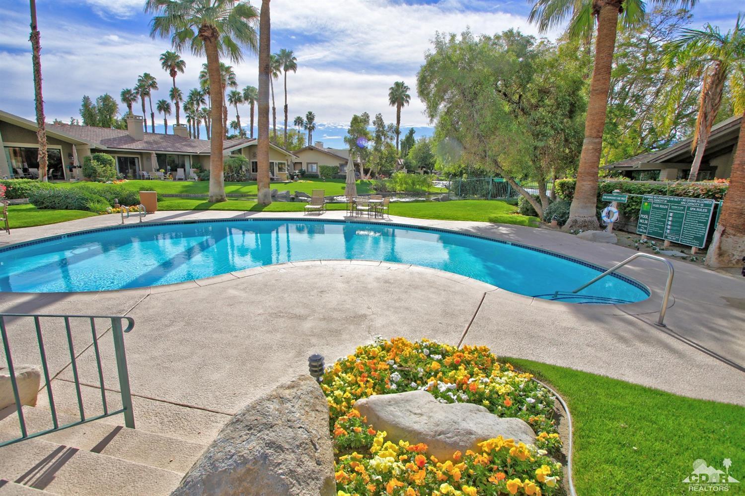 198 Ranch View Circle Palm Desert, CA 92211 - Photo 53 of 54 a view of swimming pool with outdoor seating and plants