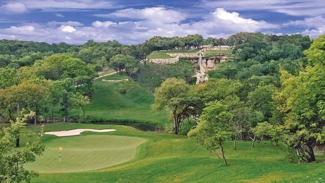 a view of a lake with a building in the background
