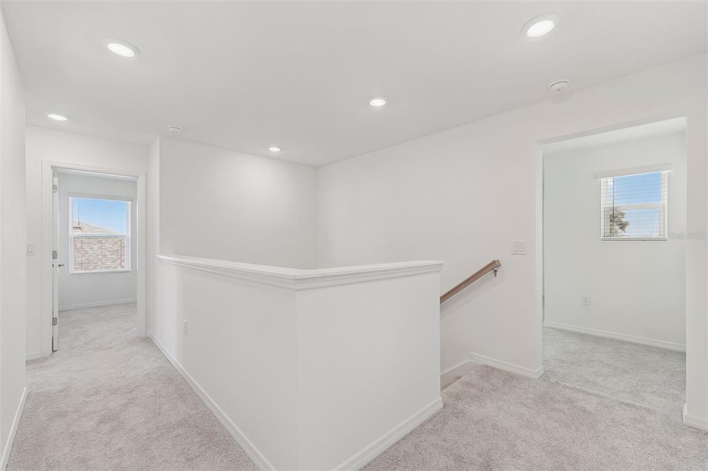 188 Jones Fish Camp Road Edgewater, FL 32141 - Photo 13 of 34 a view of hallway with stairs