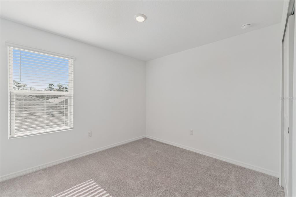 188 Jones Fish Camp Road Edgewater, FL 32141 - Photo 20 of 34 an empty room with a window