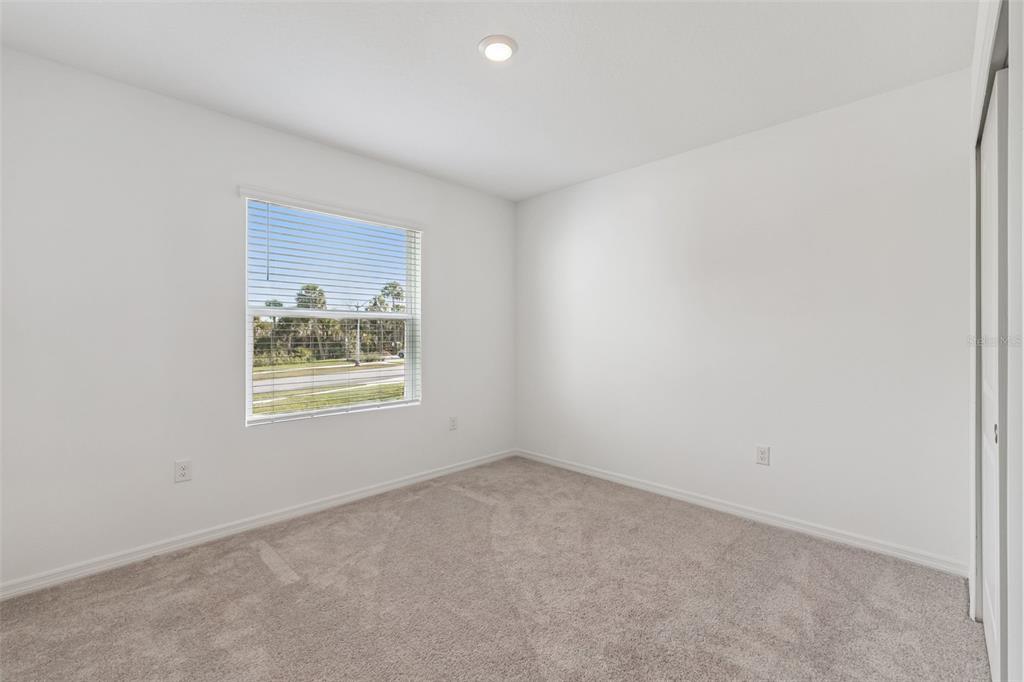 188 Jones Fish Camp Road Edgewater, FL 32141 - Photo 22 of 34 an empty room with a window
