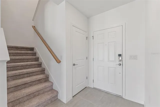 a view of entryway with wooden floor