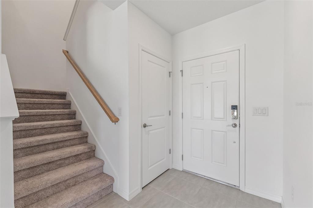 188 Jones Fish Camp Road Edgewater, FL 32141 - Photo 3 of 34 a view of entryway with wooden floor