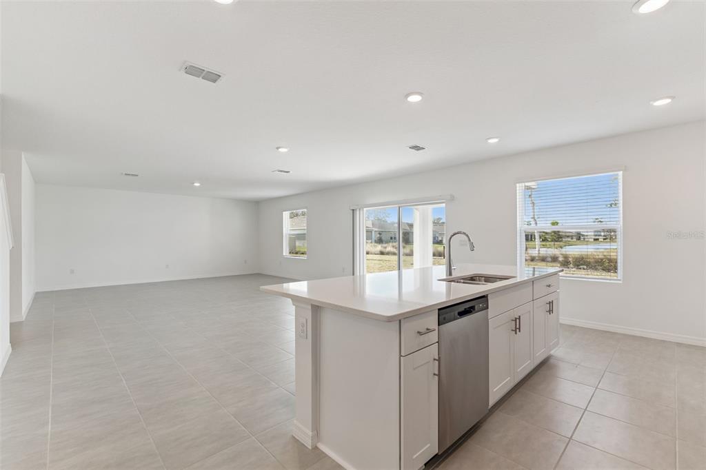 188 Jones Fish Camp Road Edgewater, FL 32141 - Photo 9 of 34 a kitchen with a sink and cabinets