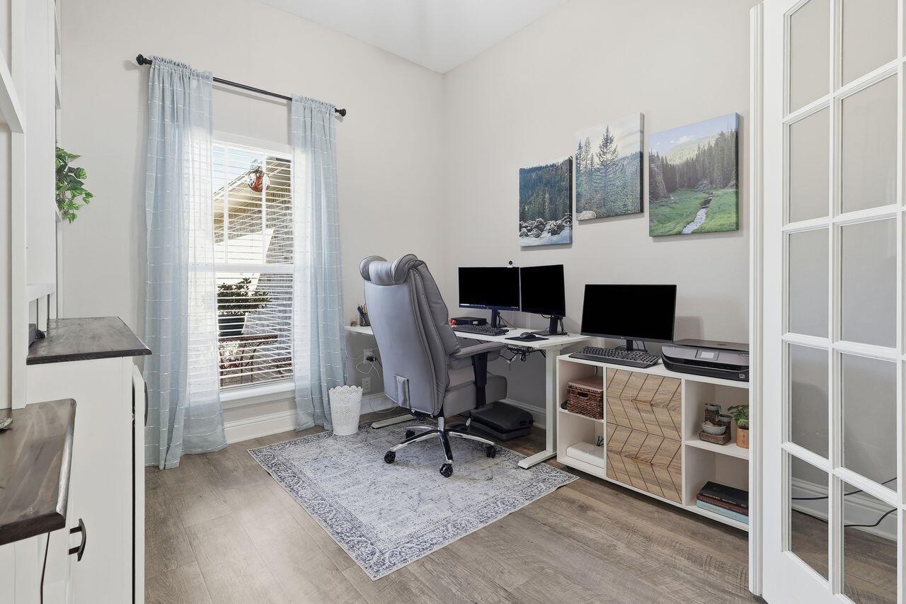 3025 Crown Creek Circle Crestview, FL 32539 - Photo 20 of 46 a view of a workspace with furniture and a window