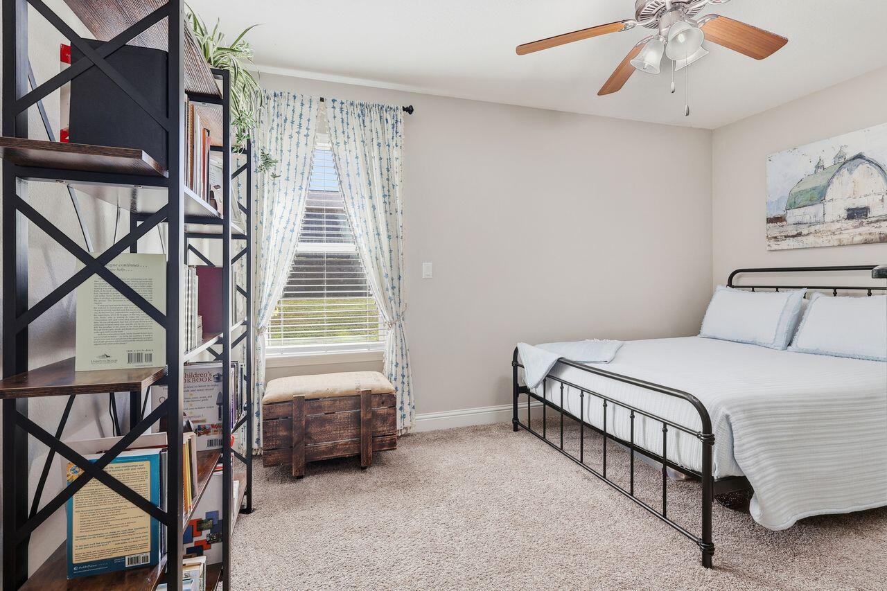 3025 Crown Creek Circle Crestview, FL 32539 - Photo 31 of 46 a bedroom with a bed and window