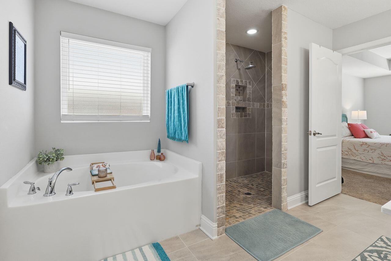 3025 Crown Creek Circle Crestview, FL 32539 - Photo 35 of 46 a bathroom with a tub sink and shower