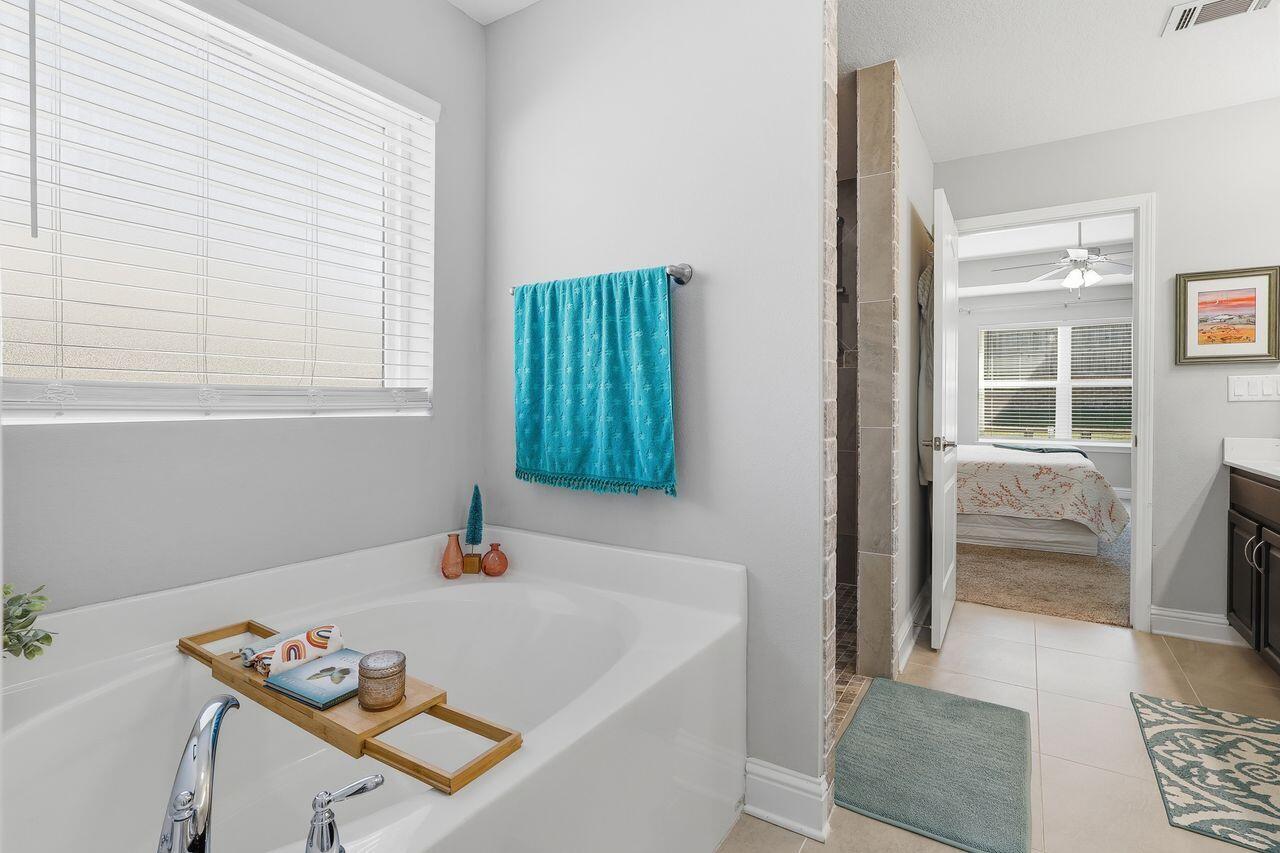 3025 Crown Creek Circle Crestview, FL 32539 - Photo 37 of 46 a living room with furniture and a window