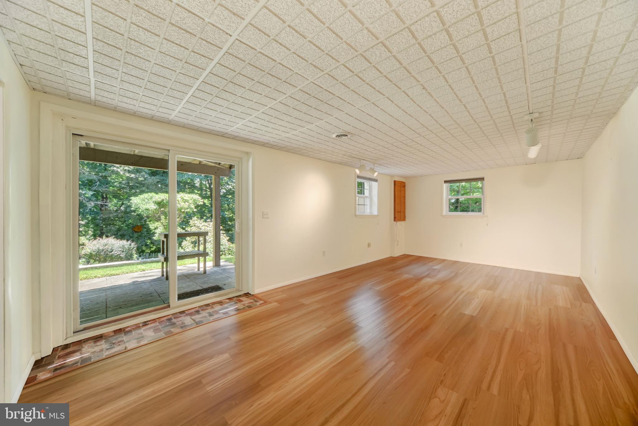 403 Old Orchard Road Baltimore, MD 21229 - Photo 20 of 37 Walk-Out Lower Level Family Room