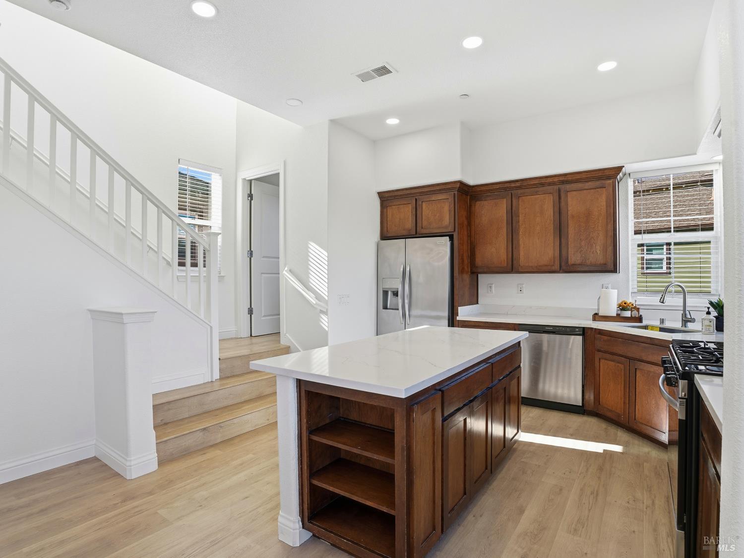 4424 Streamside Drive Santa Rosa, CA 95409 - Photo 17 of 55 a kitchen with a cabinets and appliances