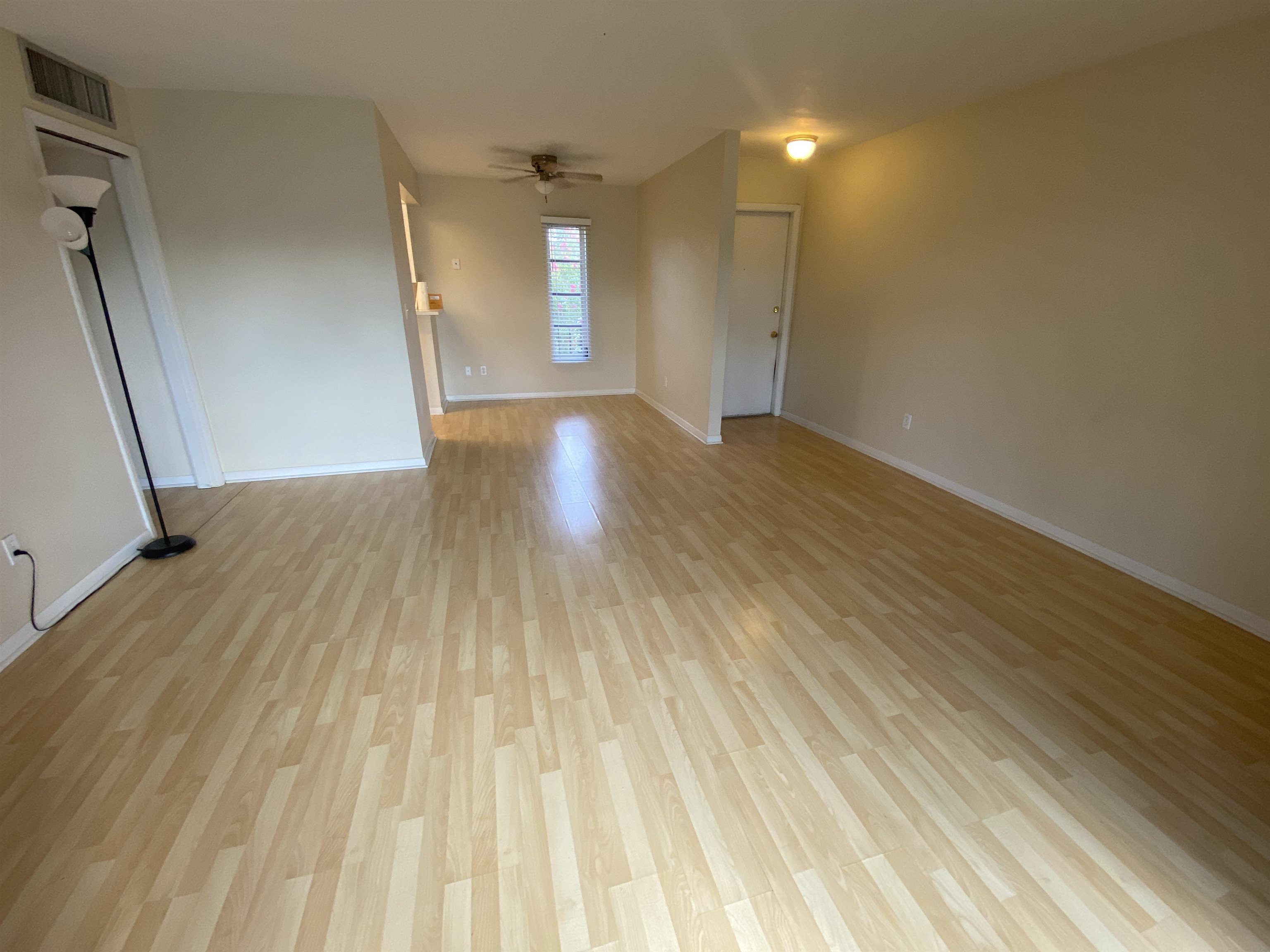 600 Domenico Circle, Unit C16 St. Augustine, FL 32086 - Photo 13 of 23 wooden floor in an empty room with a window
