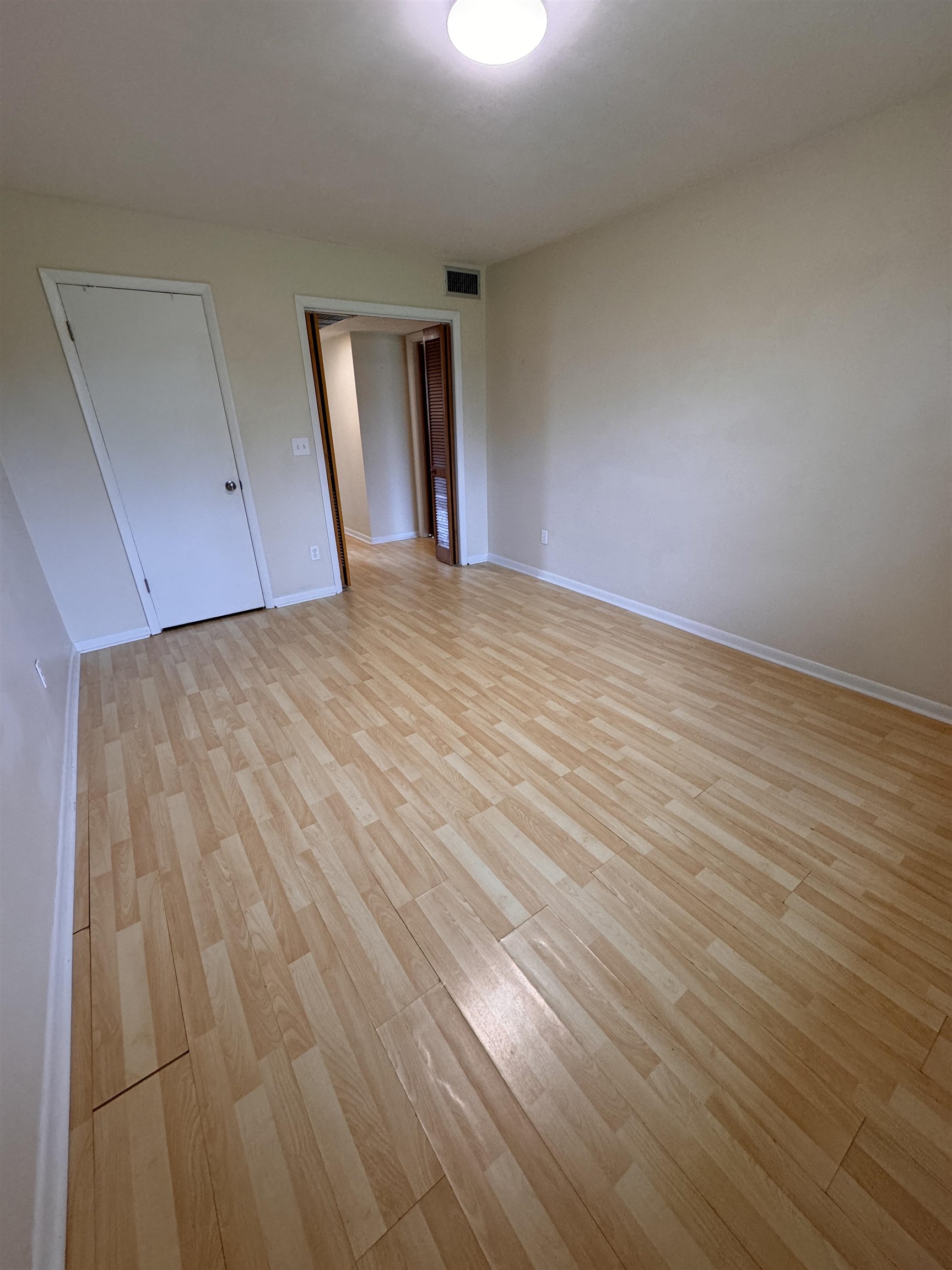 600 Domenico Circle, Unit C16 St. Augustine, FL 32086 - Photo 15 of 23 a view of empty room with wooden floor