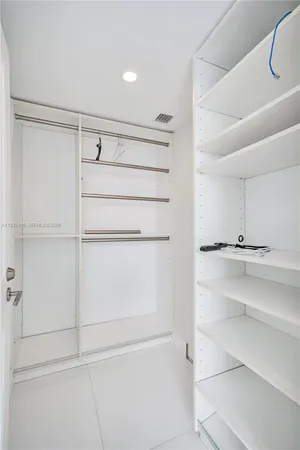 a view of kitchen and hallway