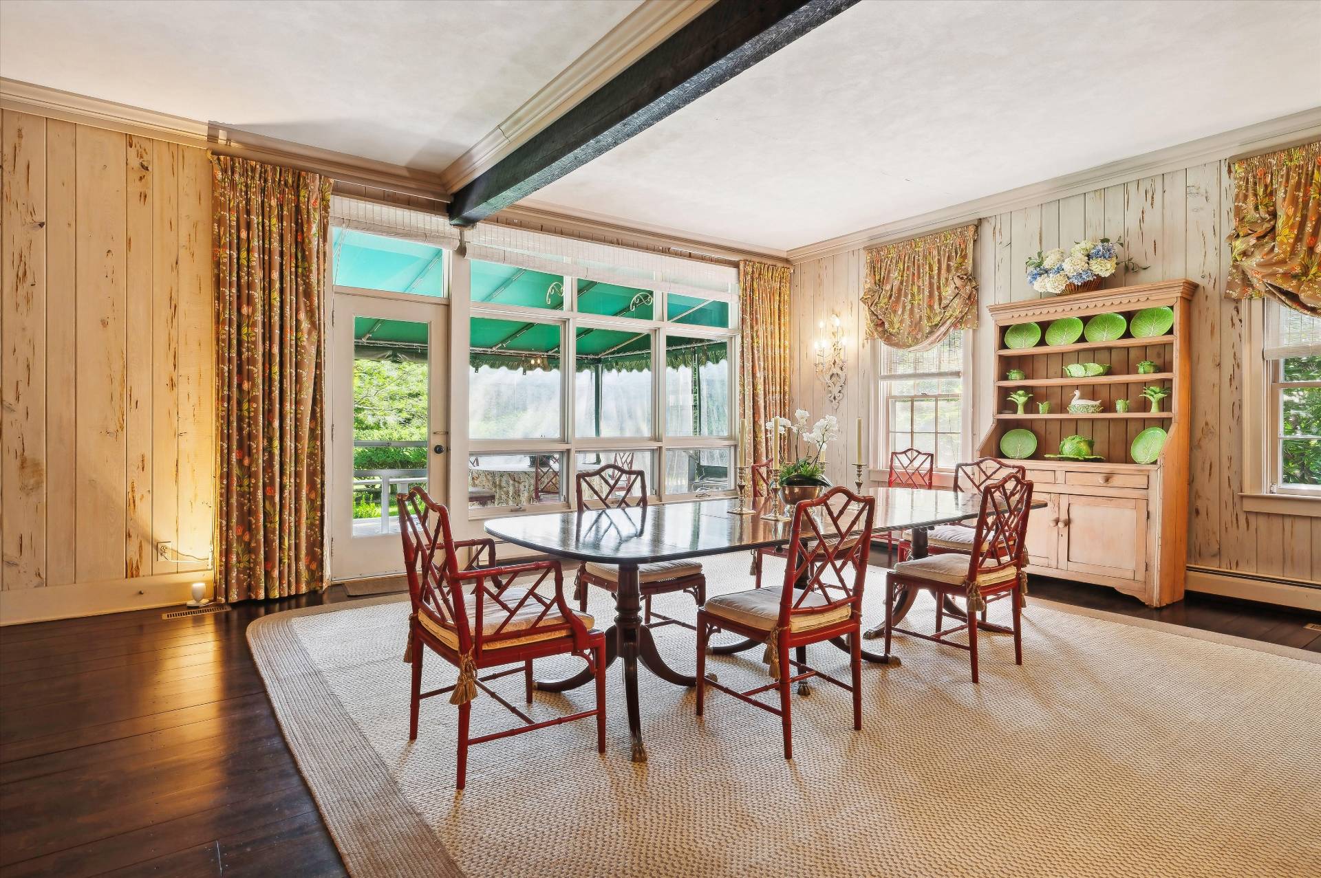 32 Ox Pasture Road Southampton, NY 11968 - Photo 14 of 25 a dining room with furniture and wooden floor