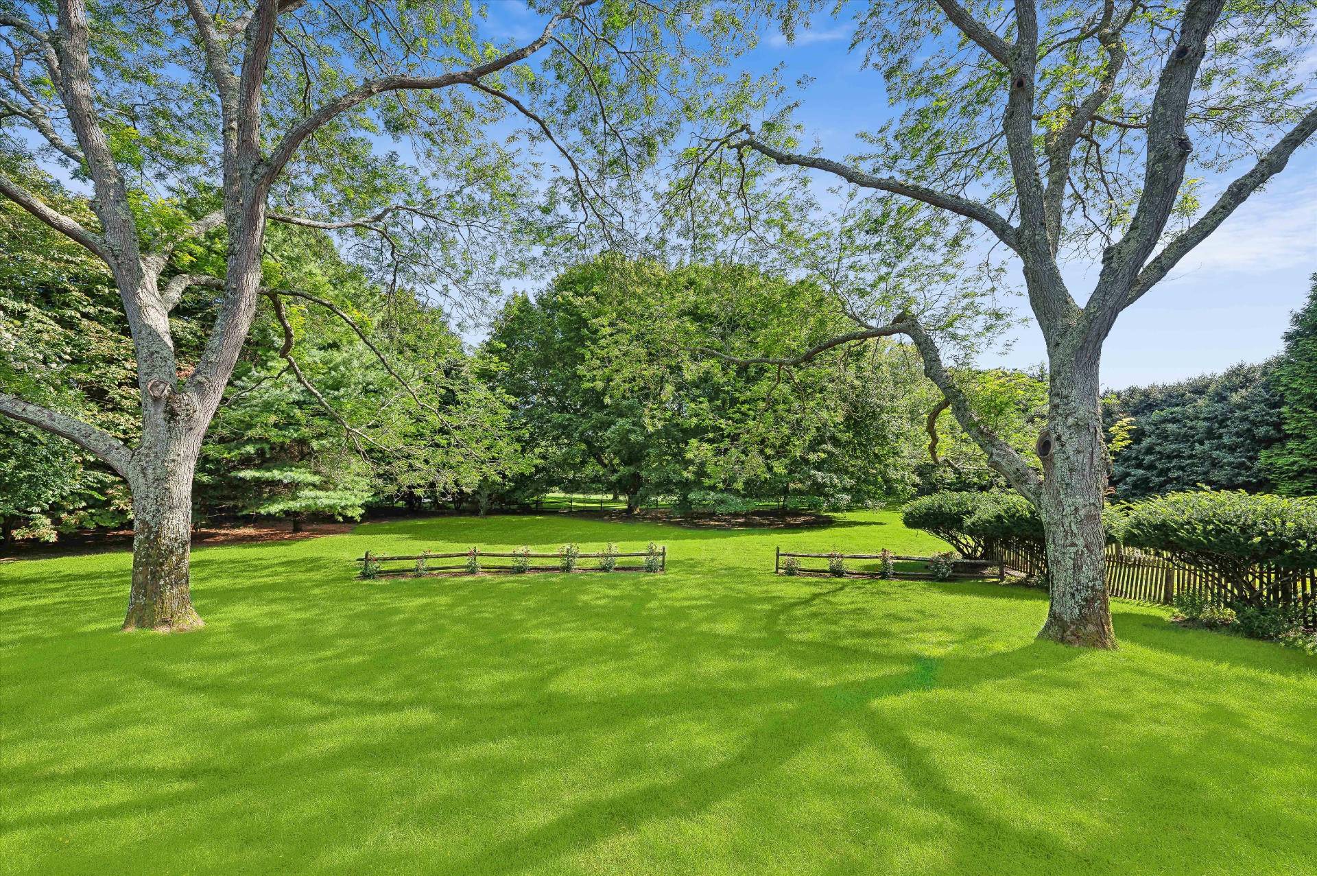 32 Ox Pasture Road Southampton, NY 11968 - Photo 9 of 25 a view of field with trees in the background
