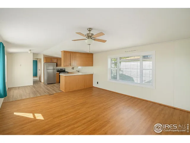 a view of a kitchen with a stove cabinets and a wooden floor