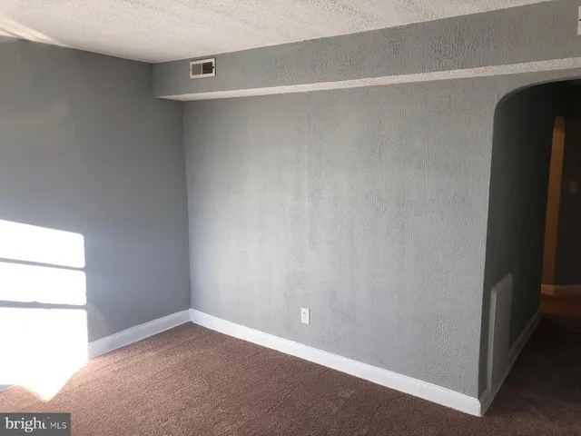 a kitchen with a stove and a microwave