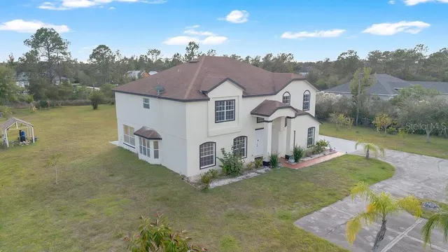 a kitchen with stainless steel appliances granite countertop a stove sink and cabinets