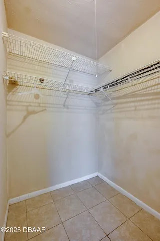 a view of a room with racks on the wall