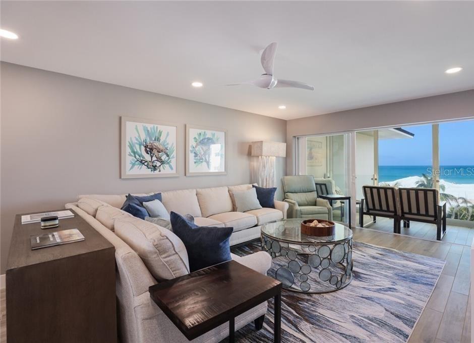 2110 Benjamin Franklin Drive, Unit 503SEA Sarasota, FL 34236 - Photo 2 of 29 a living room with furniture