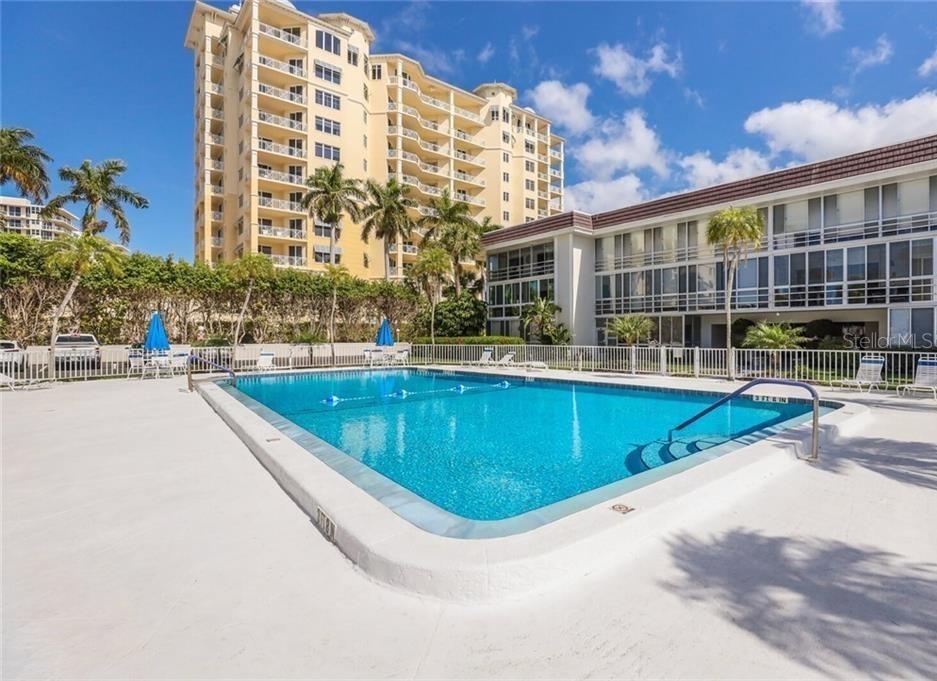2110 Benjamin Franklin Drive, Unit 503SEA Sarasota, FL 34236 - Photo 25 of 29 a view of a swimming pool and a outdoor space