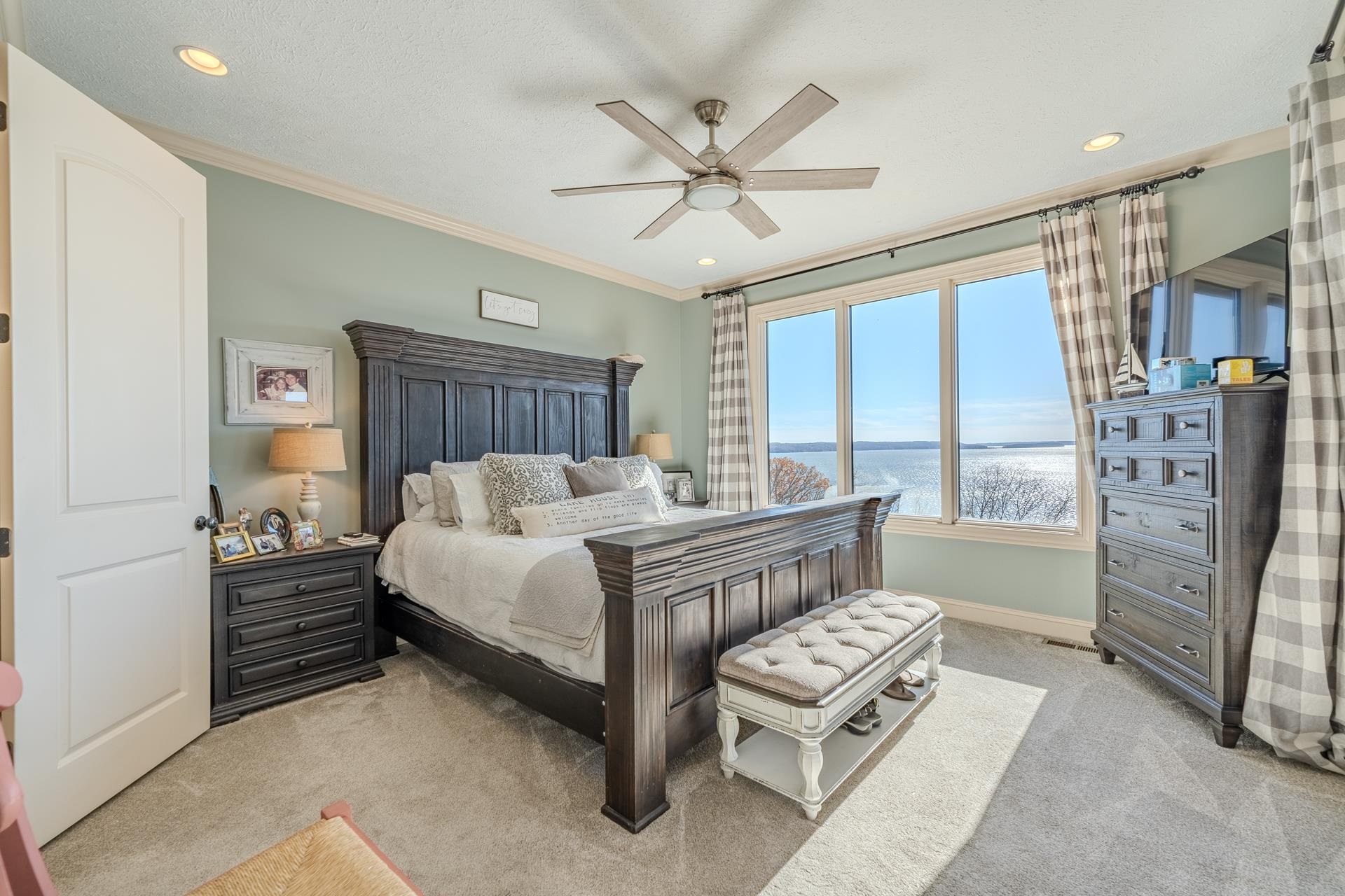 75 C Oasis Lane Savannah, TN 38372 - Photo 12 of 38 a bedroom with a bed and a chandelier