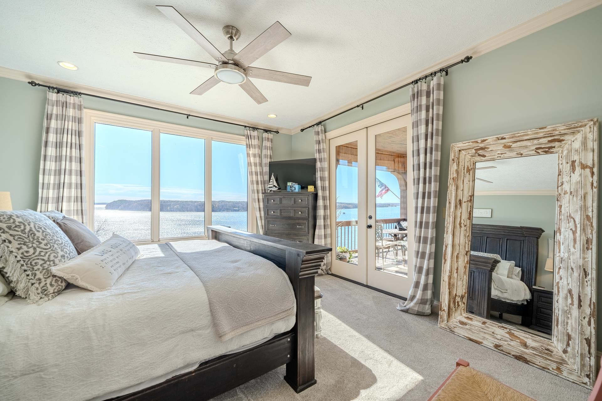 75 C Oasis Lane Savannah, TN 38372 - Photo 13 of 38 a bedroom with a large bed and a large window