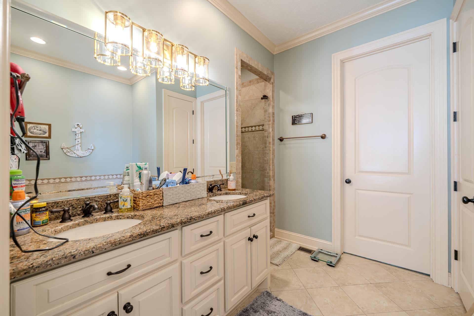 75 C Oasis Lane Savannah, TN 38372 - Photo 15 of 38 a bathroom with a granite countertop sink mirror and double