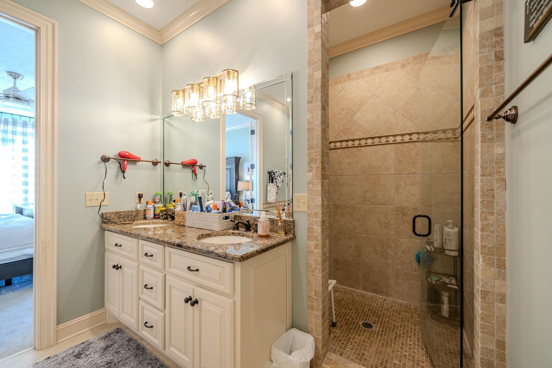 75 C Oasis Lane Savannah, TN 38372 - Photo 16 of 38 a bathroom with a sink vanity granite shower and a mirror