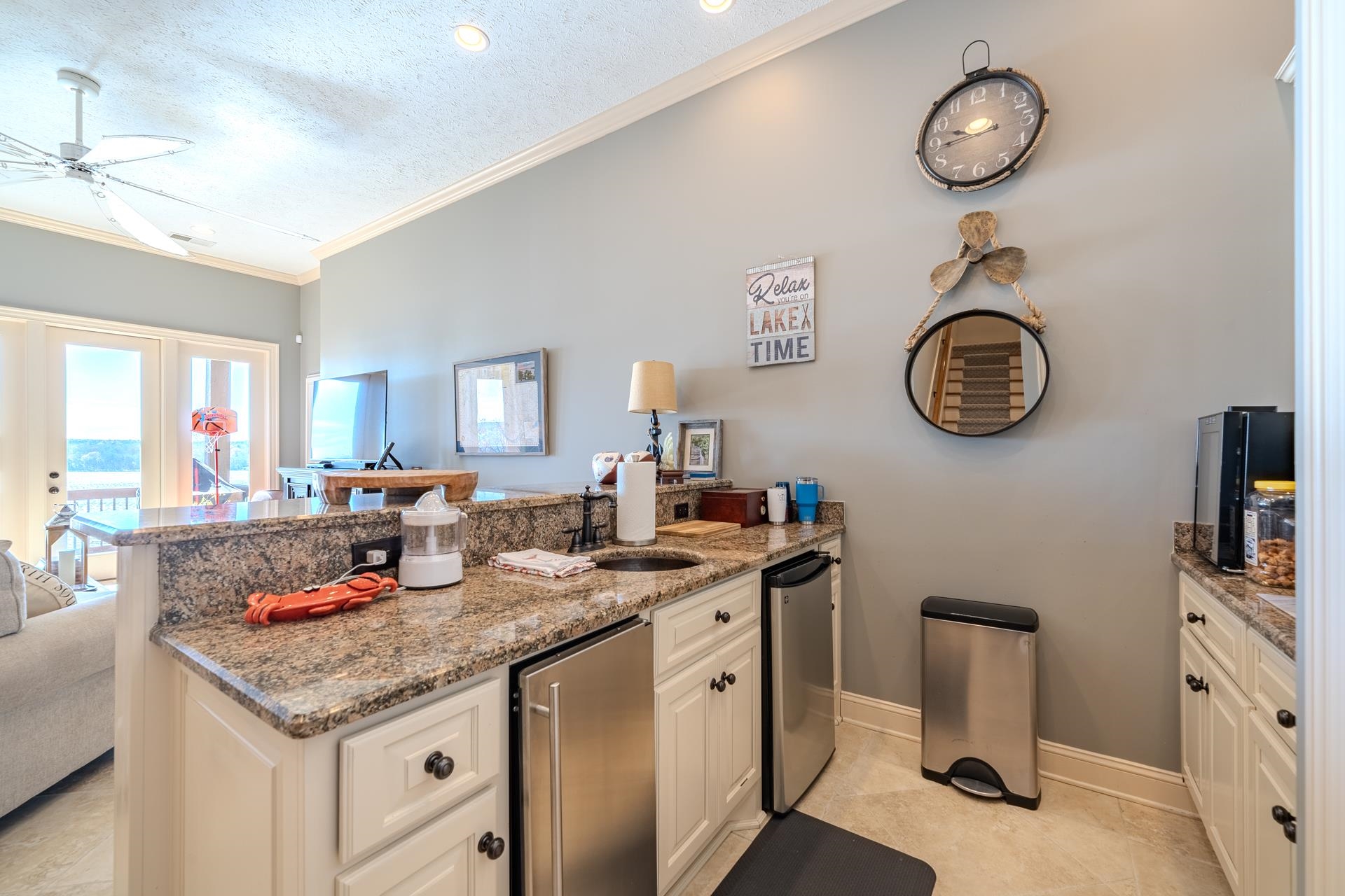 75 C Oasis Lane Savannah, TN 38372 - Photo 26 of 38 a kitchen with a stove a clock and cabinets