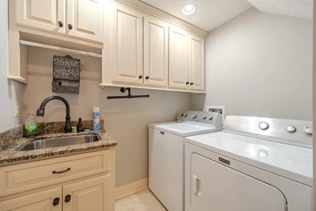 a view of a balcony with furniture