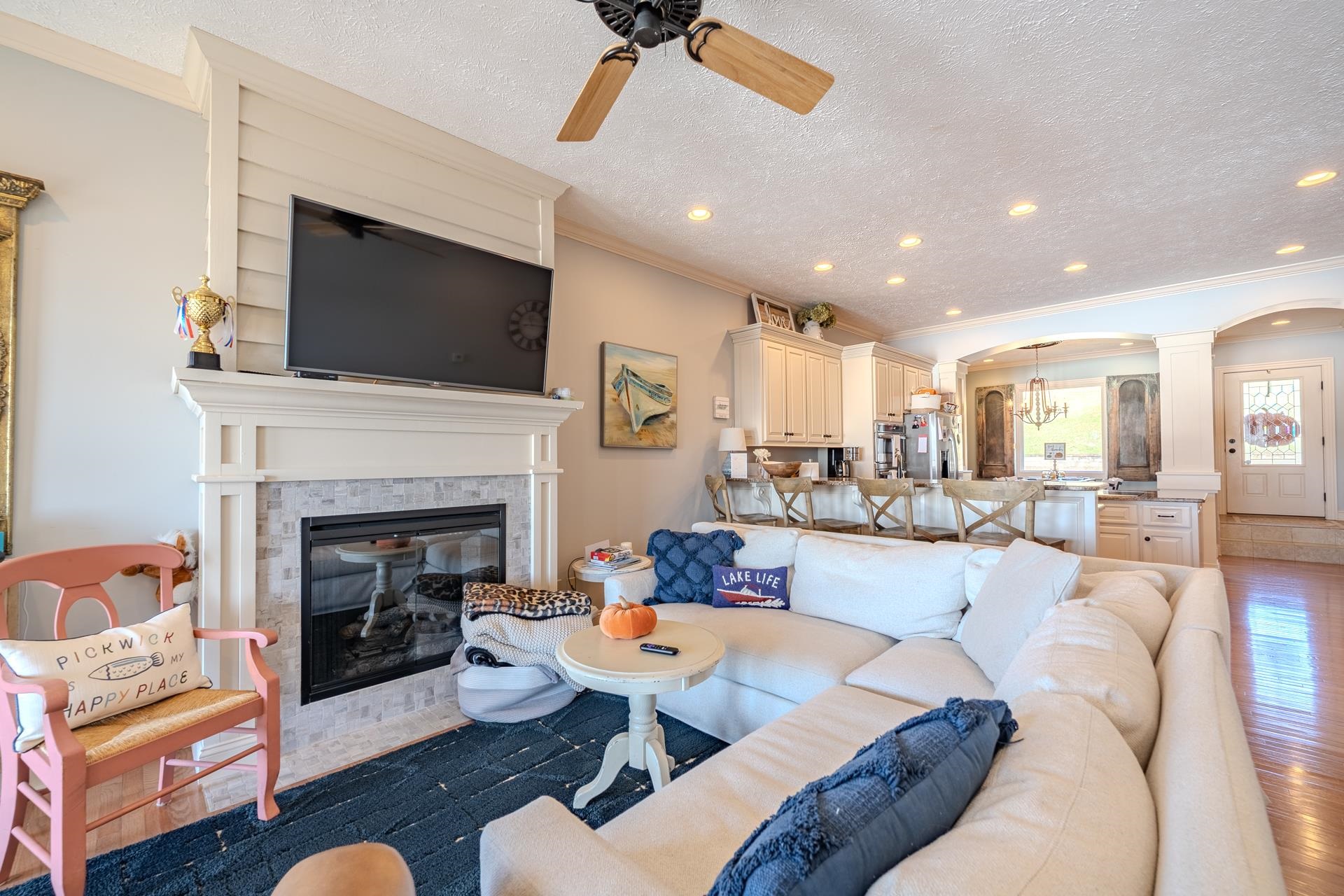 75 C Oasis Lane Savannah, TN 38372 - Photo 7 of 38 a living room with furniture fireplace and flat screen tv