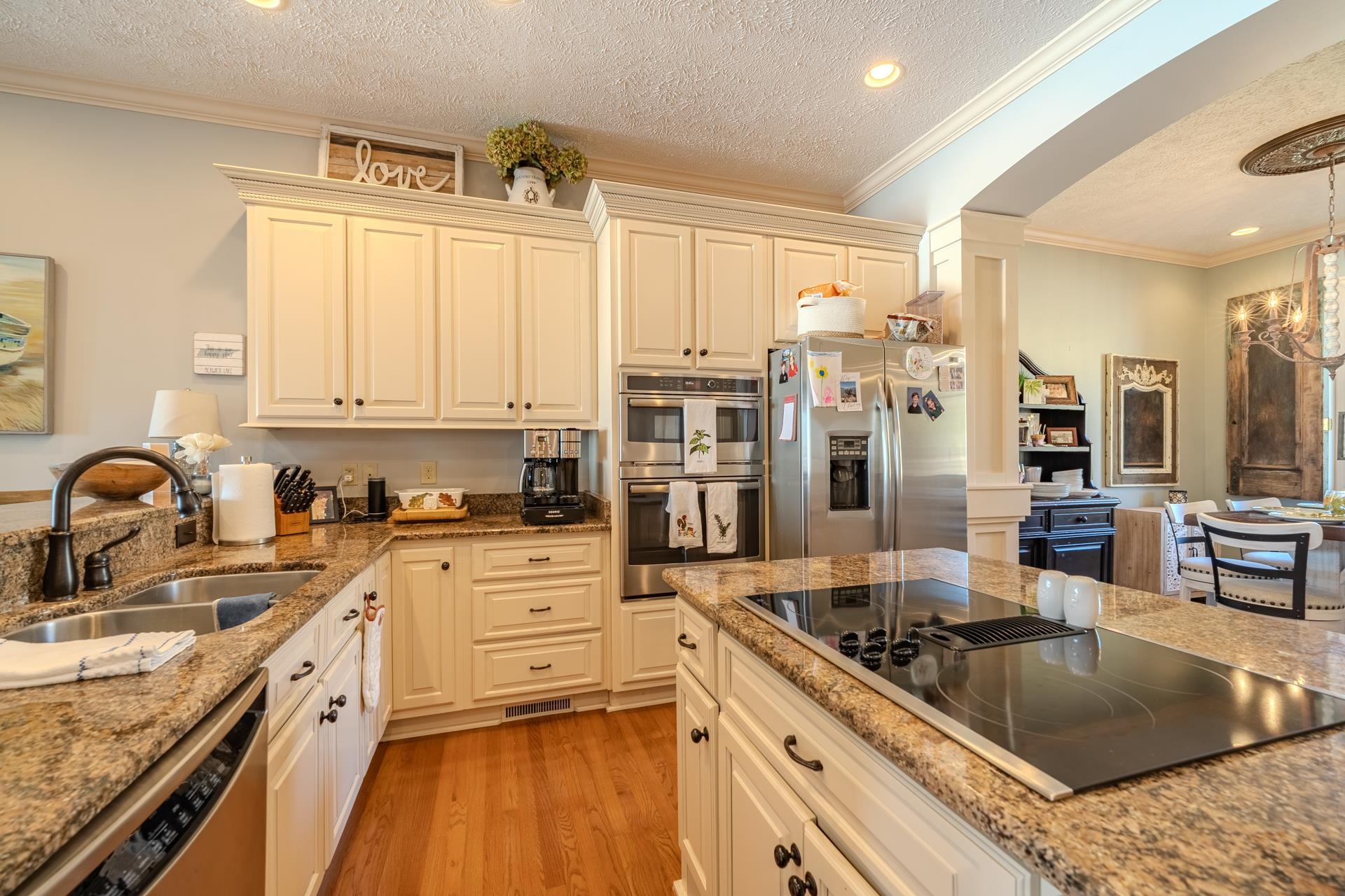 75 C Oasis Lane Savannah, TN 38372 - Photo 8 of 38 a kitchen with stainless steel appliances granite countertop a sink stove and refrigerator